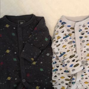 Two footie PJ’s 0-3 months